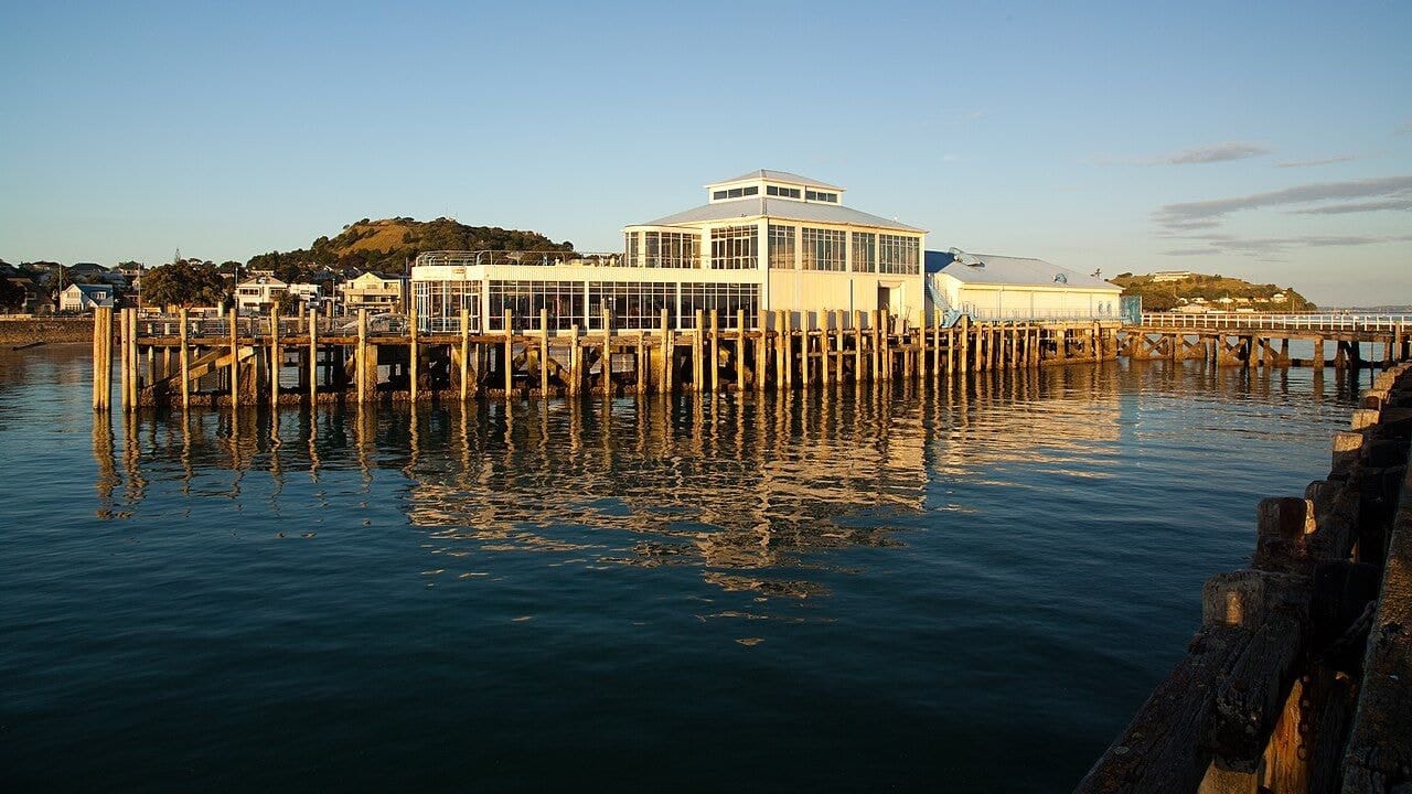 Devonport Ferry Terminal beside Auckland harbour in warm light