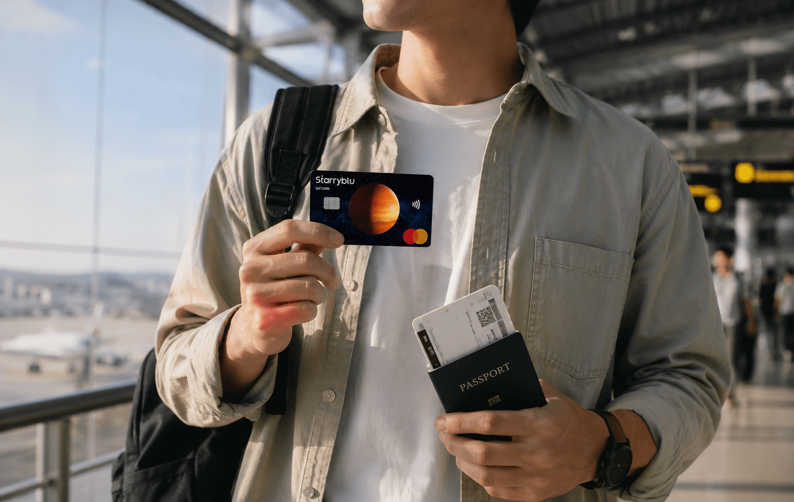Starryblu physical Mastercard used for contactless payment at a retail store, demonstrating a Global Wallet for multi-currency spending, cross-border payments, and international shopping.